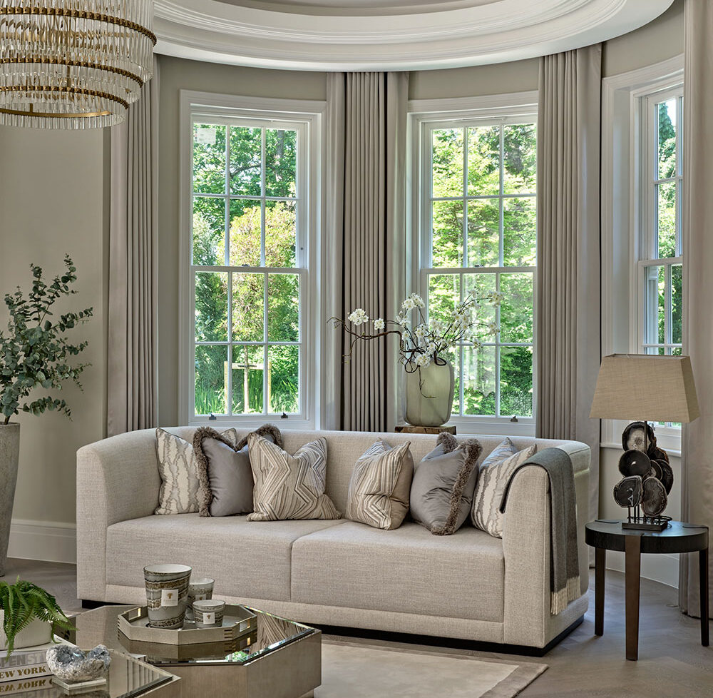 Intimate seating area within a large Hill House Interiors residence, showing how scale is softened through considered composition and lighting